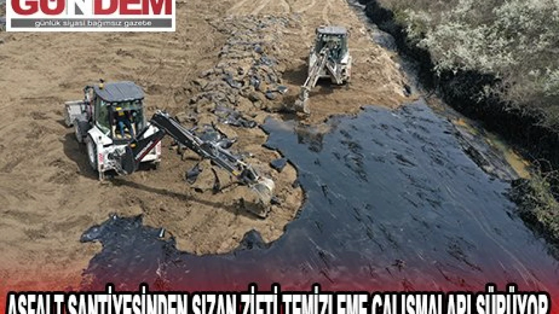 ASFALT ŞANTİYESİNDEN SIZAN ZİFTİ TEMİZLEME ÇALIŞMALARI SÜRÜYOR