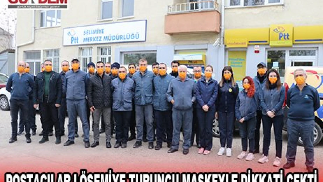 Postacılar lösemiye turuncu maskeyle dikkati çekti