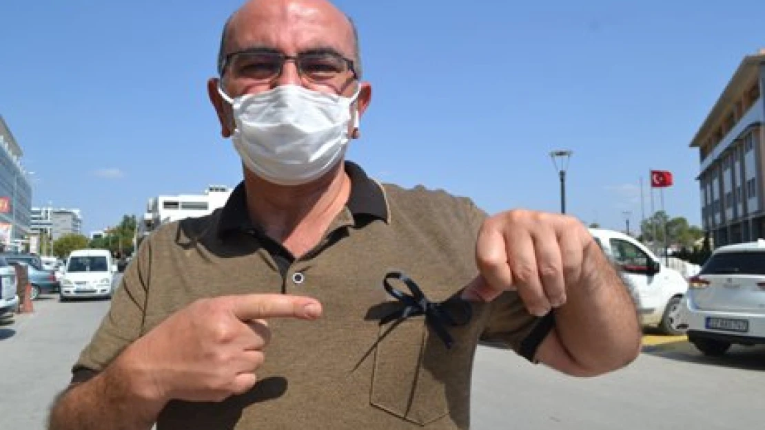 Pandemiye siyah kurdeleli uyarı