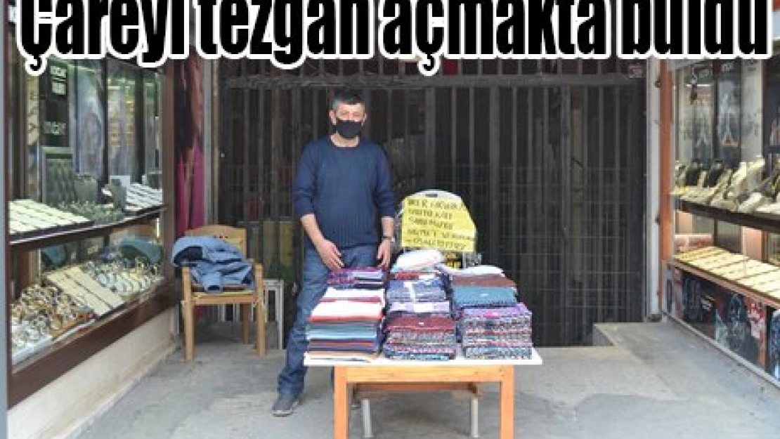 Çareyi tezg&acirch açmakta buldu