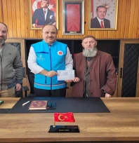 Gazze'ye destek amacıyla kurulan hayır çarşısının geliri TDV'ye teslim edildi