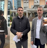 İmam cübbesi giyip elinde alkol şişesiyle poz veren şüpheli, adliyeye sevk edildi