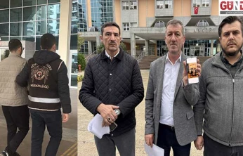 İmam cübbesi giyip elinde alkol şişesiyle poz veren şüpheli, adliyeye sevk edildi