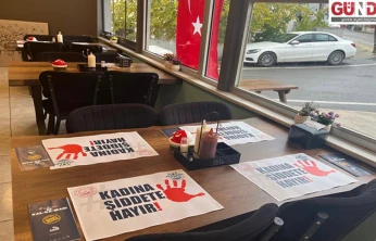 Masalara yerleştirilen mesaj: 'Kadına Şiddete Hayır'