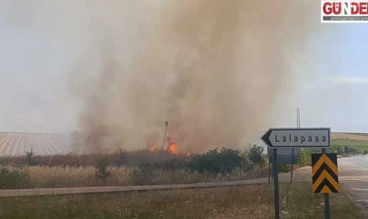 Saman yüklü römorkta çıkan yangın tarlalara sıçradı