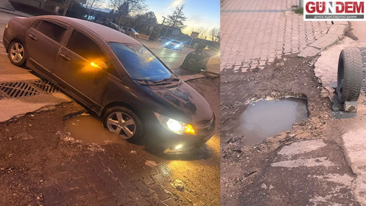 Çukura düşen aracın lastikleri patladı